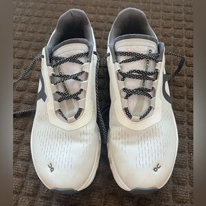 Women Size 10.5 men size 9 - On Cloudmonster Low Undyed White